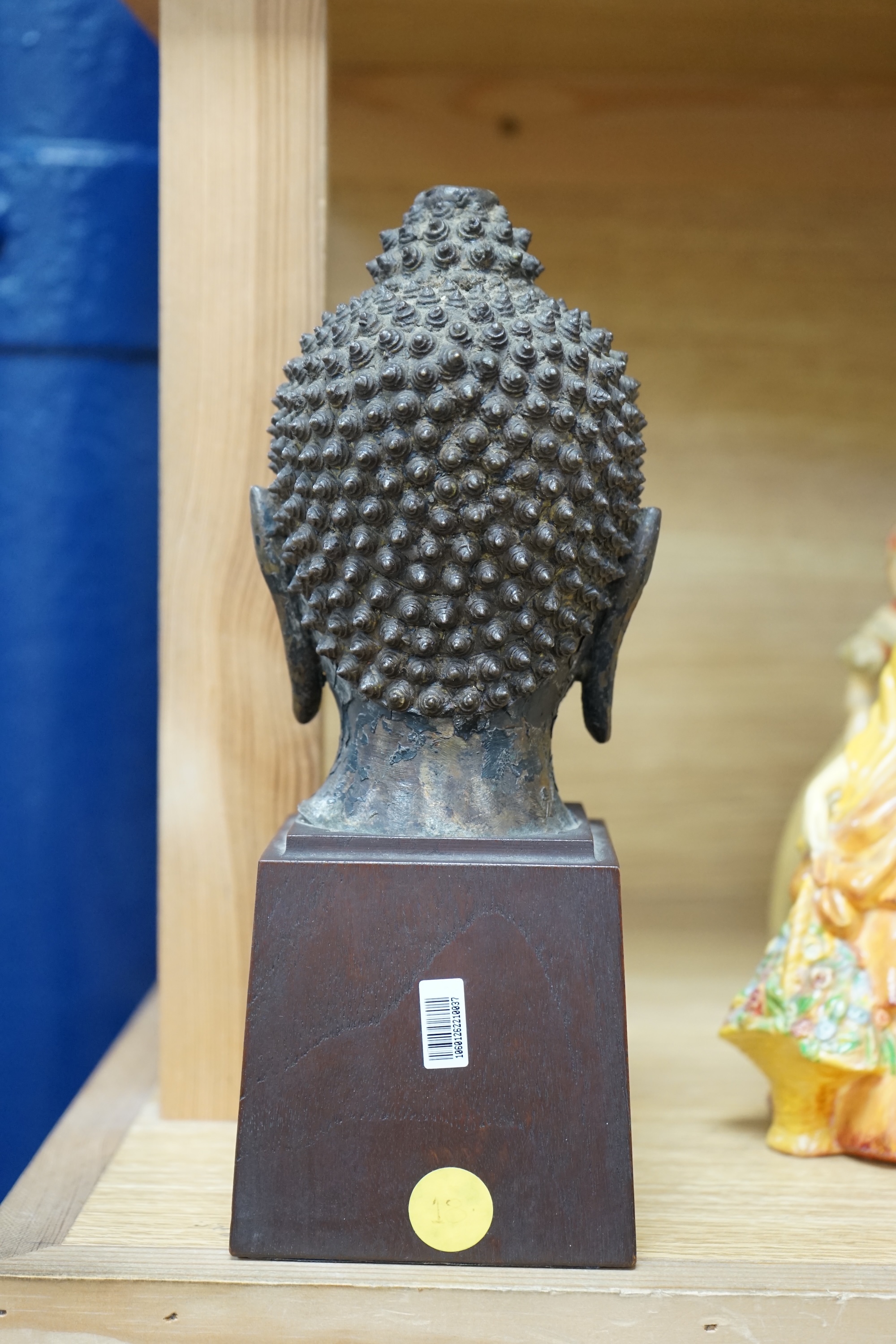 A Thai bronze head of Buddha, probably 18th century, 25cm high. Condition - good